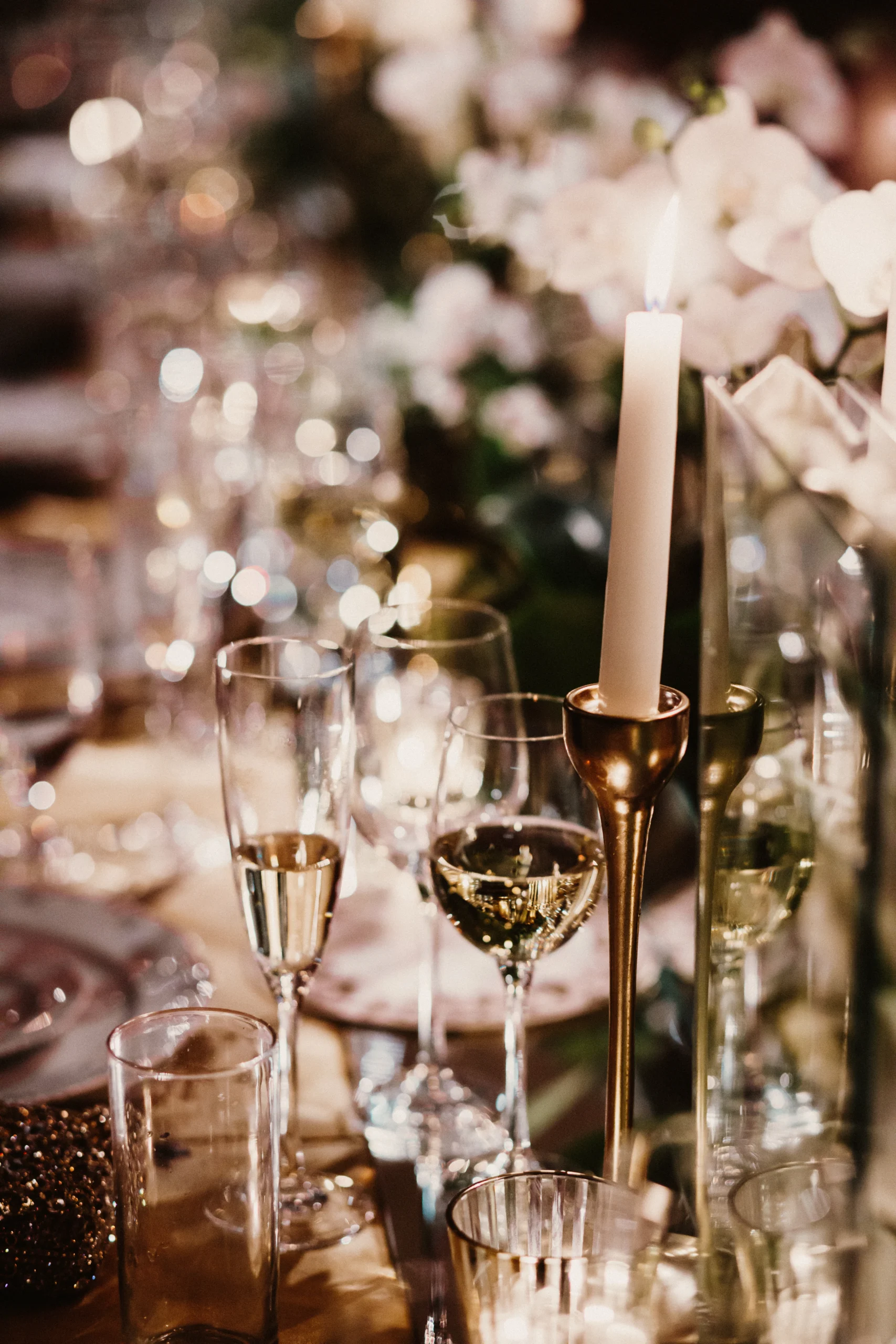 Glasses of champagne elegantly arranged on a festive table.