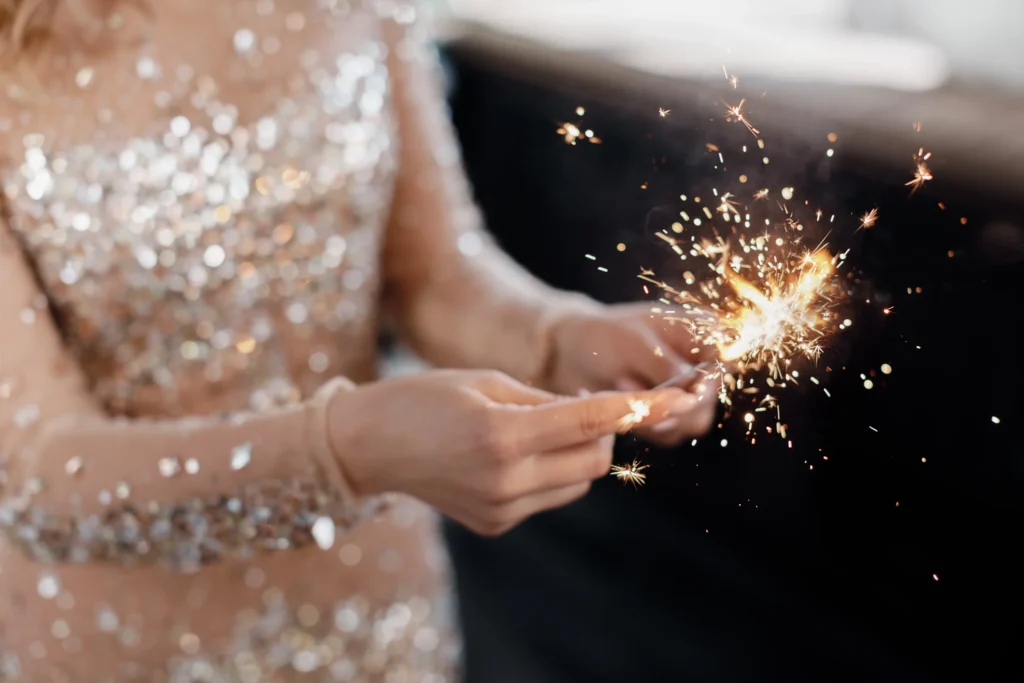 Fire lights illuminating a wedding event, creating a magical ambiance.