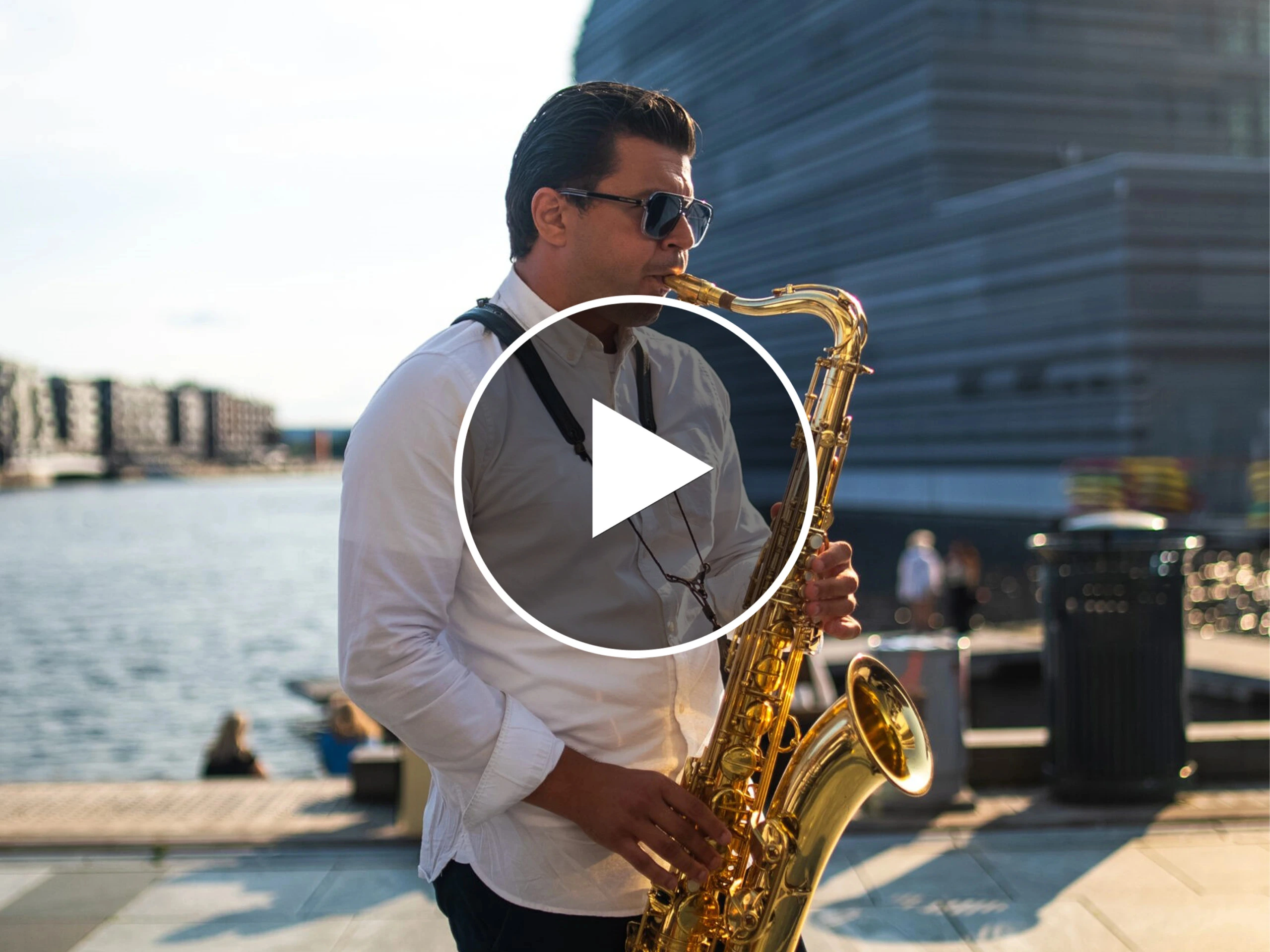 A man playing the saxophone as part of Romslo Entertainment in Norway.