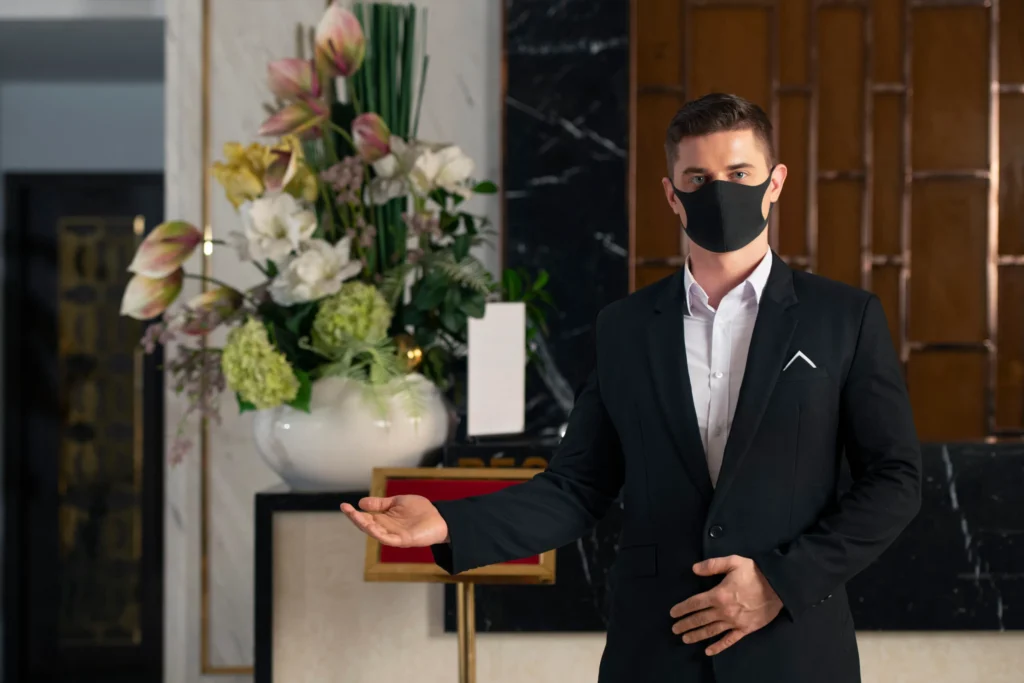 A man serving as a receptionist at a memorial event.